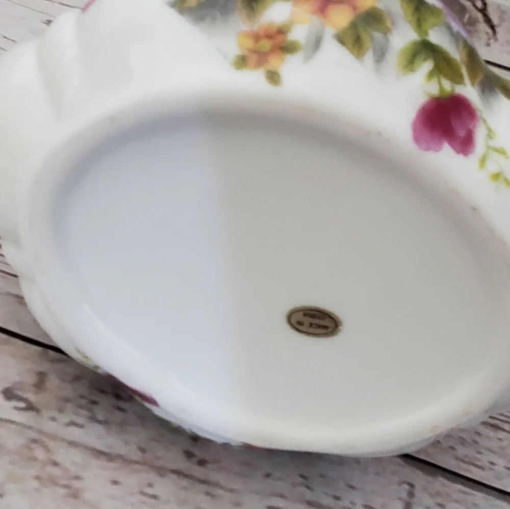 Vintage porcelain basket with flowers on it white, pink, purple, green
